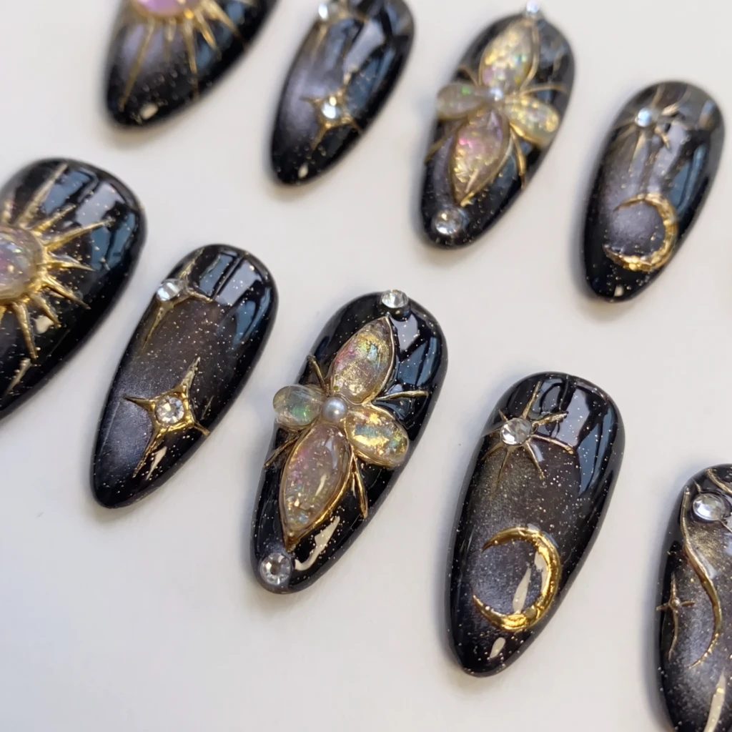 Black 3D Gold Chrome Sun And Stars, Gothic Almond Nails, Party Night Look